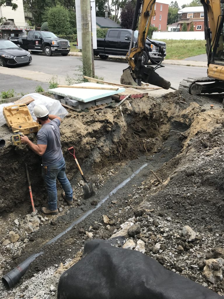 Branchement municipal et raccordement d'égout par Gesco Construction